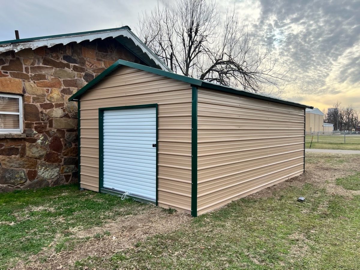Small enclosed Legacy metal utility shed with roll-up door